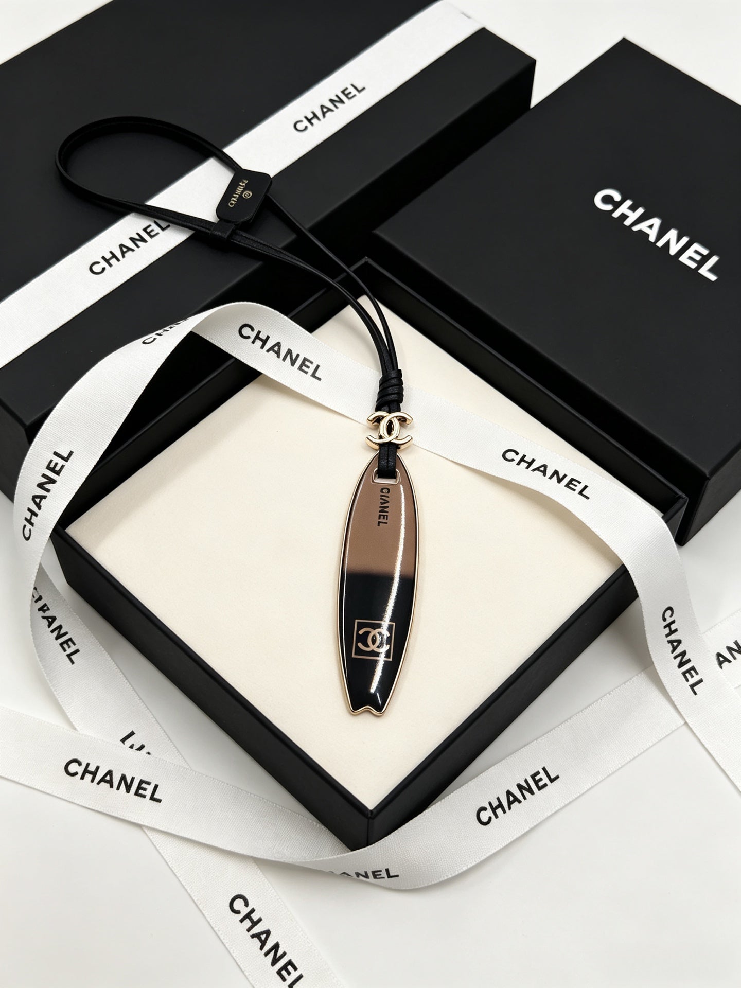 CC Surfboard-shaped Leather Cord Charm
