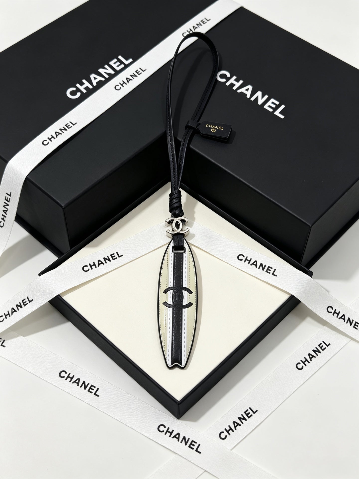 CC Surfboard-shaped Leather Cord Charm