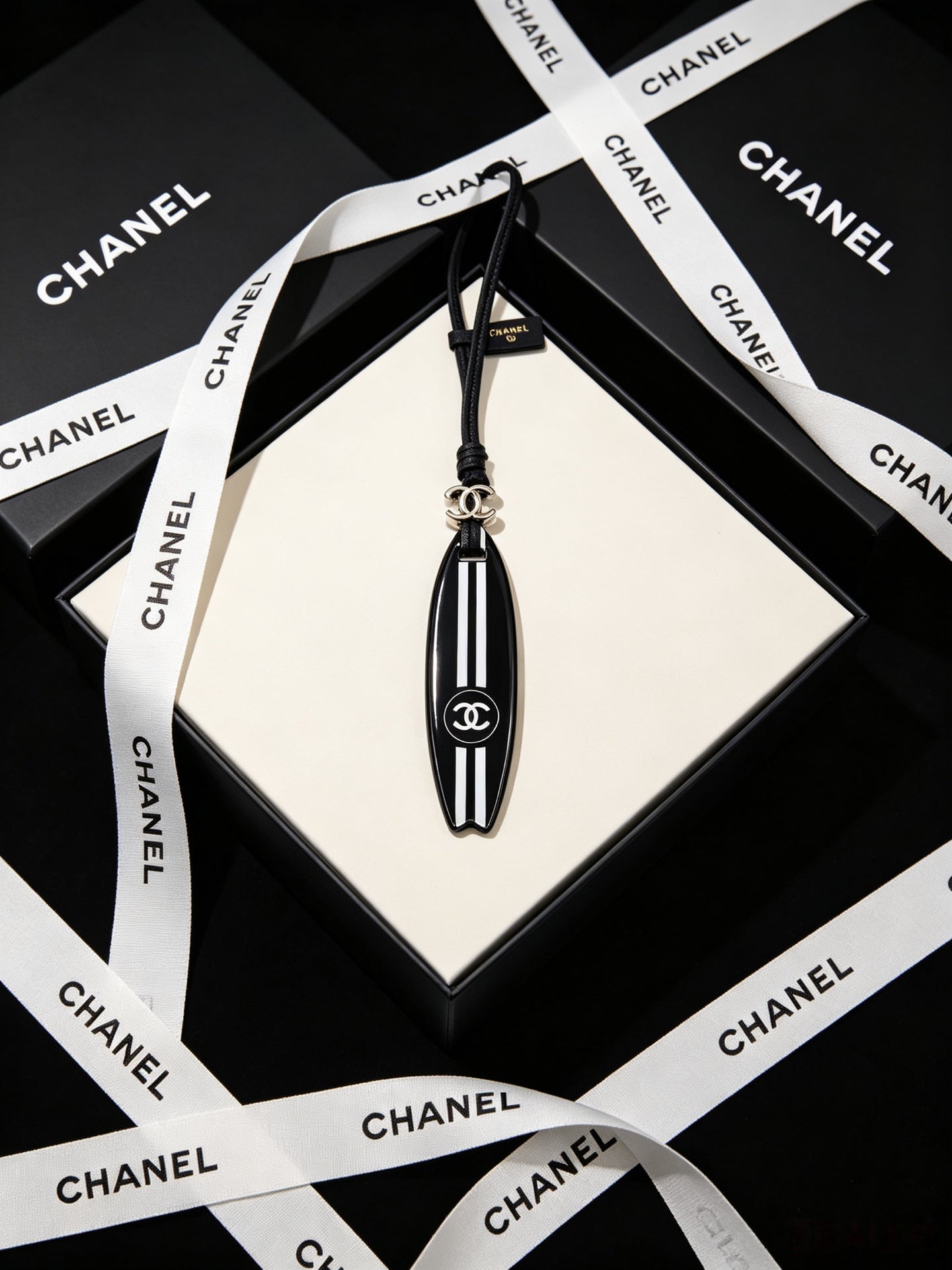 CC Surfboard-shaped Leather Cord Charm